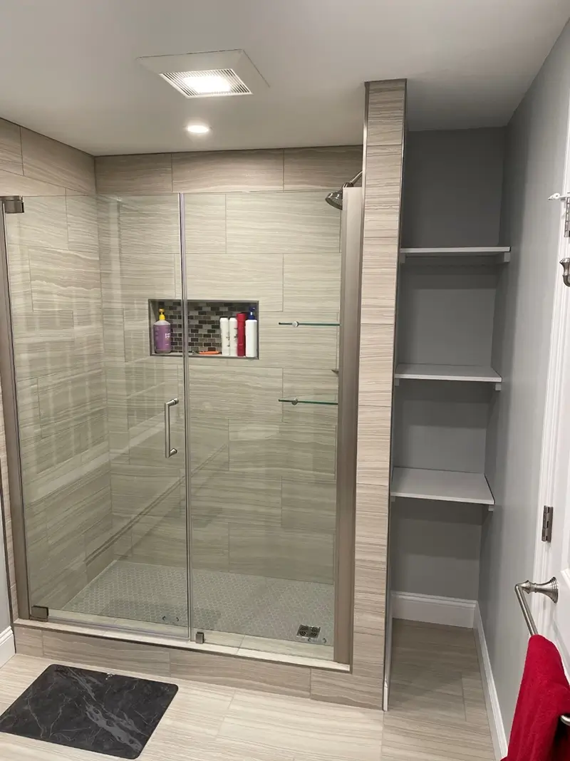 Newly remodeled bathroom with glass door shower