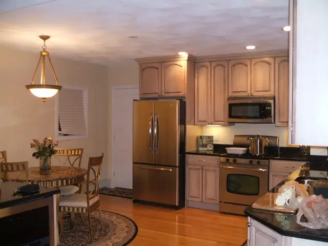 Newly remodeled kitchen with oak cabinets, new appliances, hardwood floors