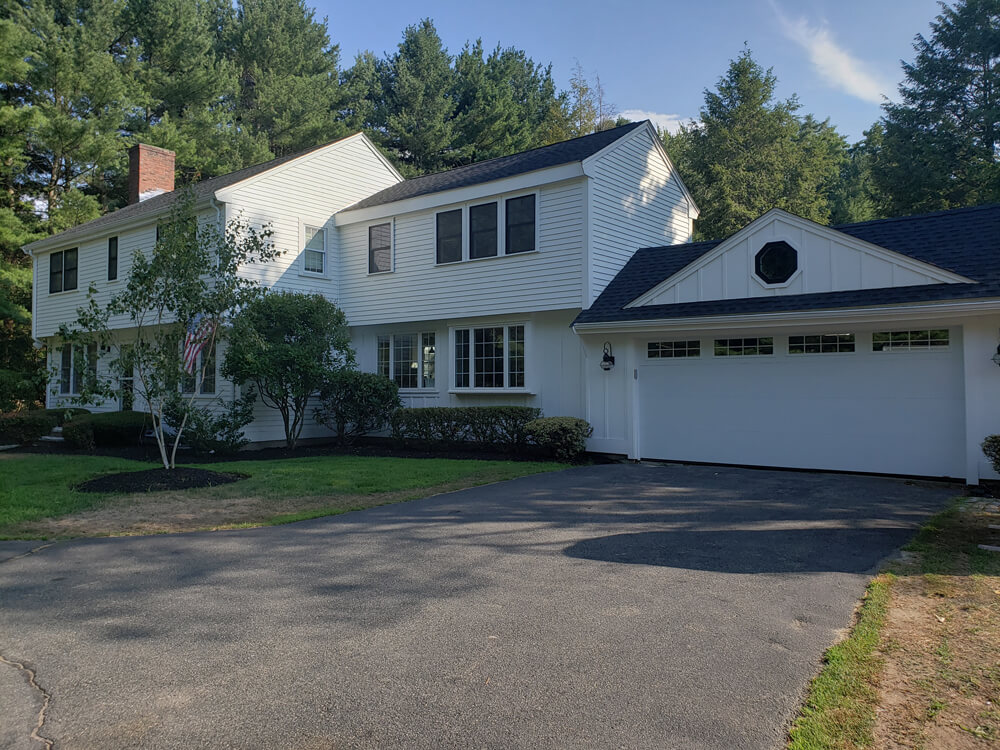 home addition second floor with garage exterior shot