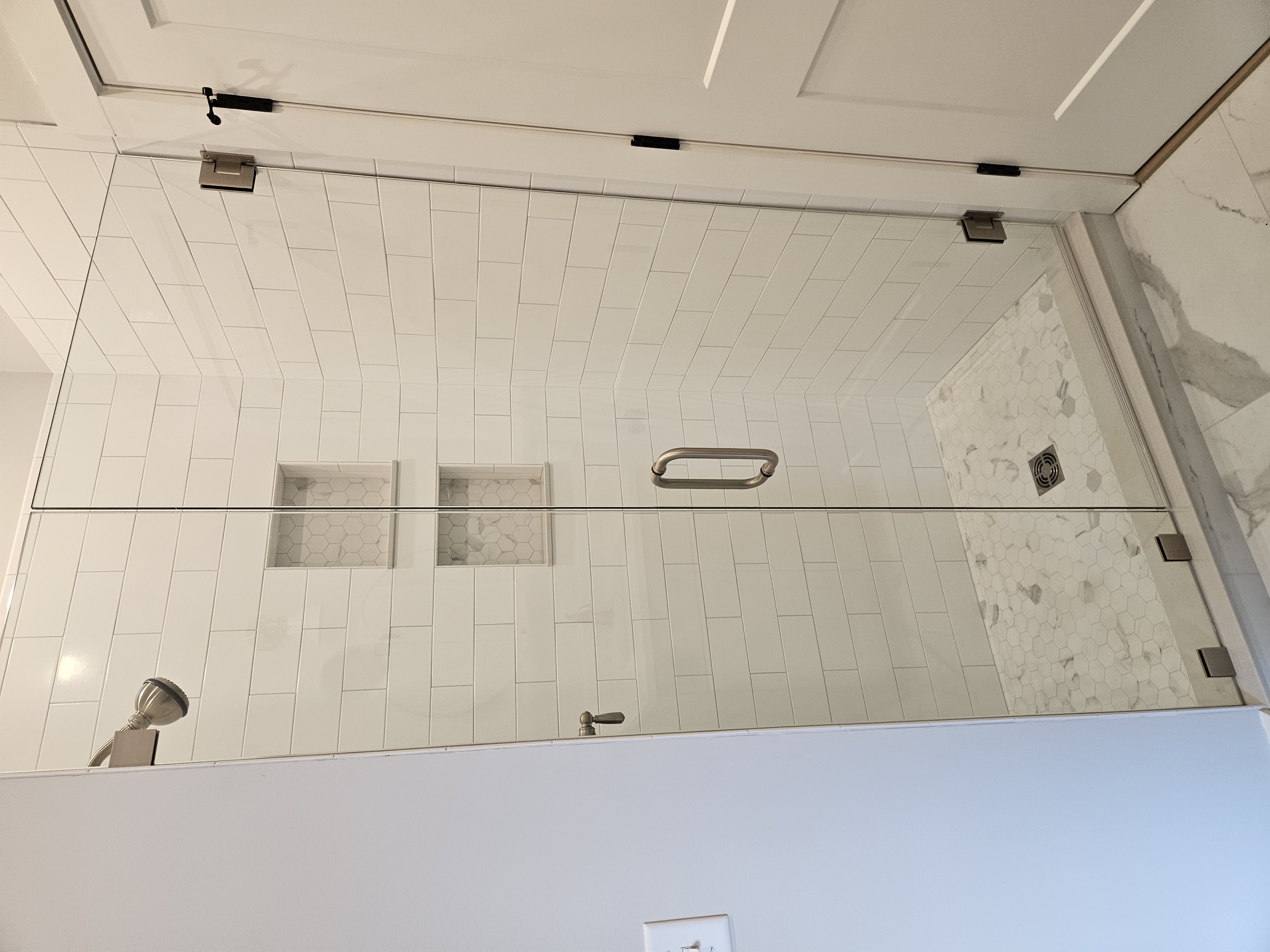 Fine stand up shower in Haverhill with high-end glass door and satin nickel finishes
