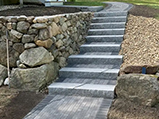 Home front walkway, granite steps, and pathway