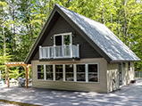 New home construction cabin with deck and porch