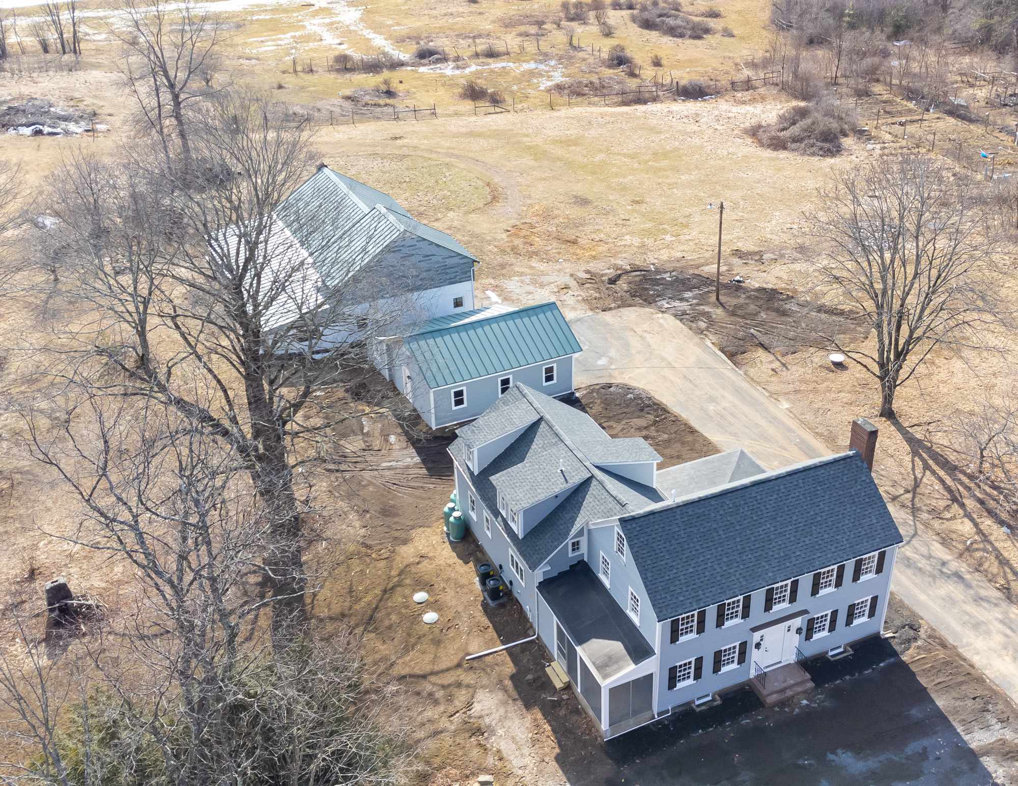 Aerial image of the complete main house and barn renovation in Durham NH