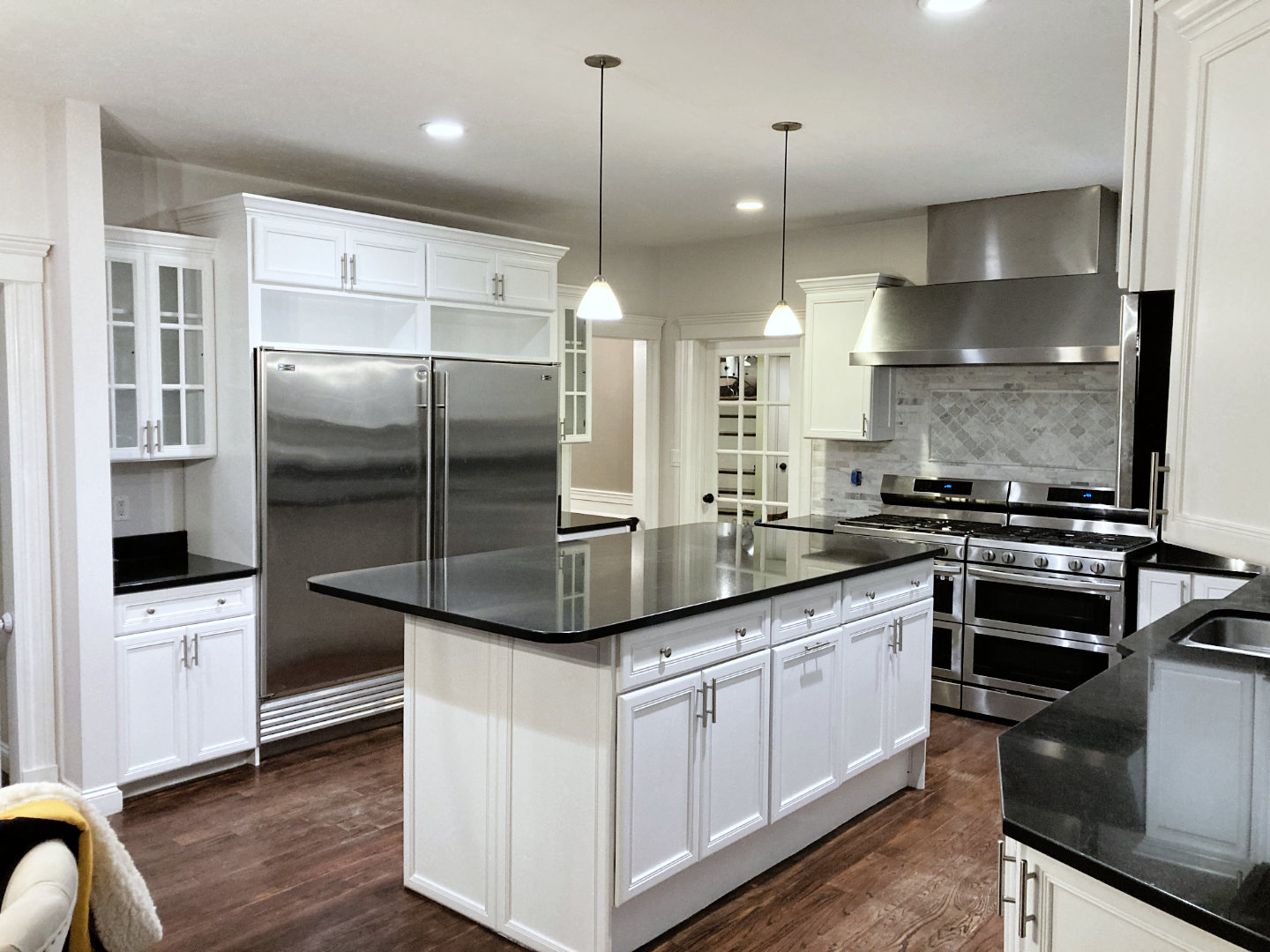 White kitchen cabinets recently refinished